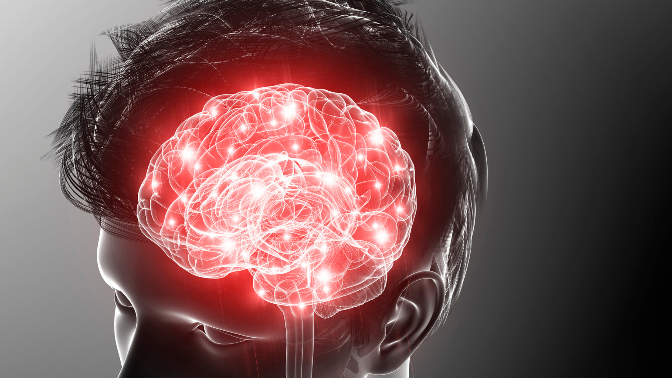 animated of an adult human head with the brain glowing through in red and white lighted neurons