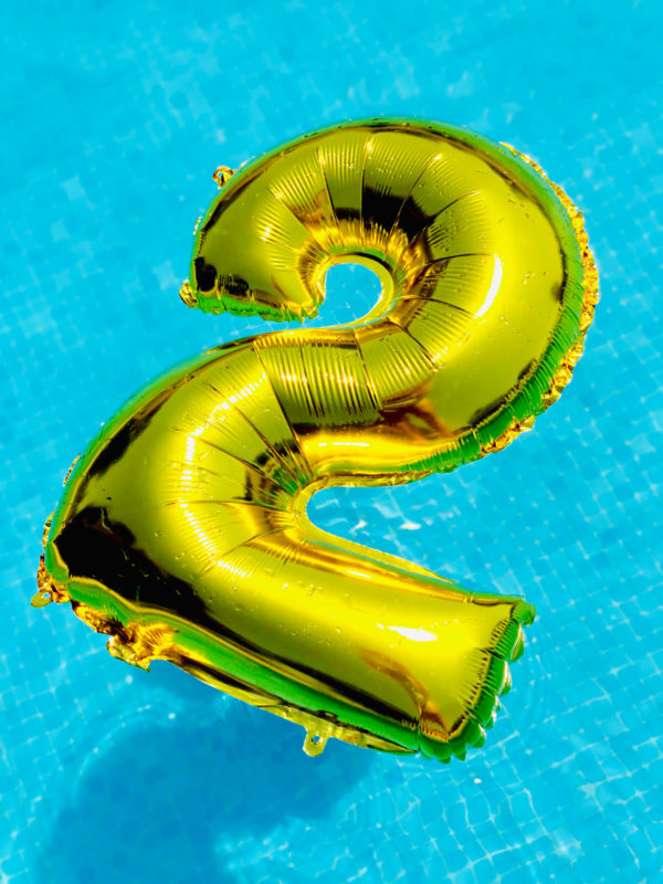 Balloon number 2 floating in the pool