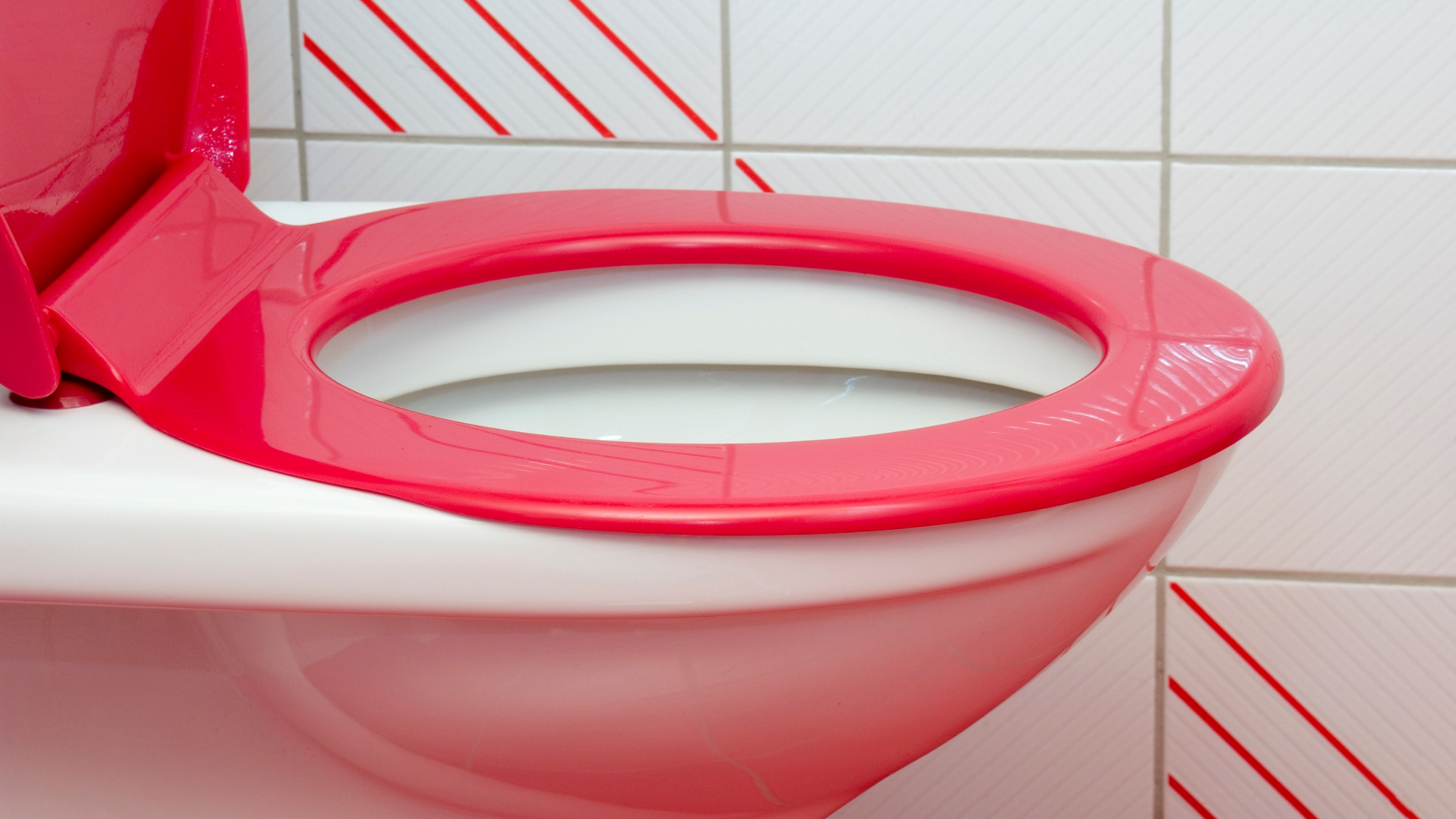 Color-coded red toilet seat