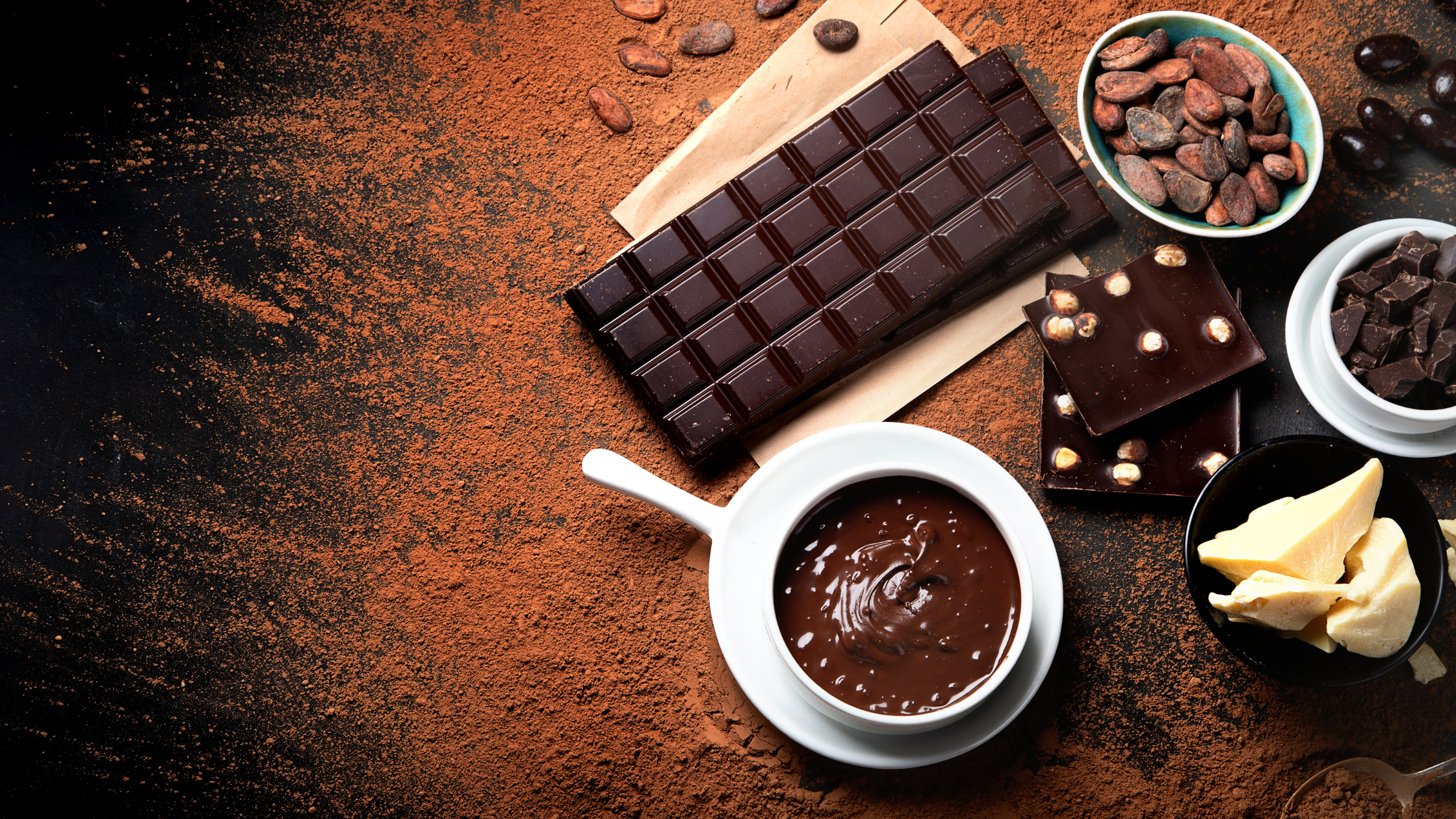 variety of forms and types of chocolate on a tabletop