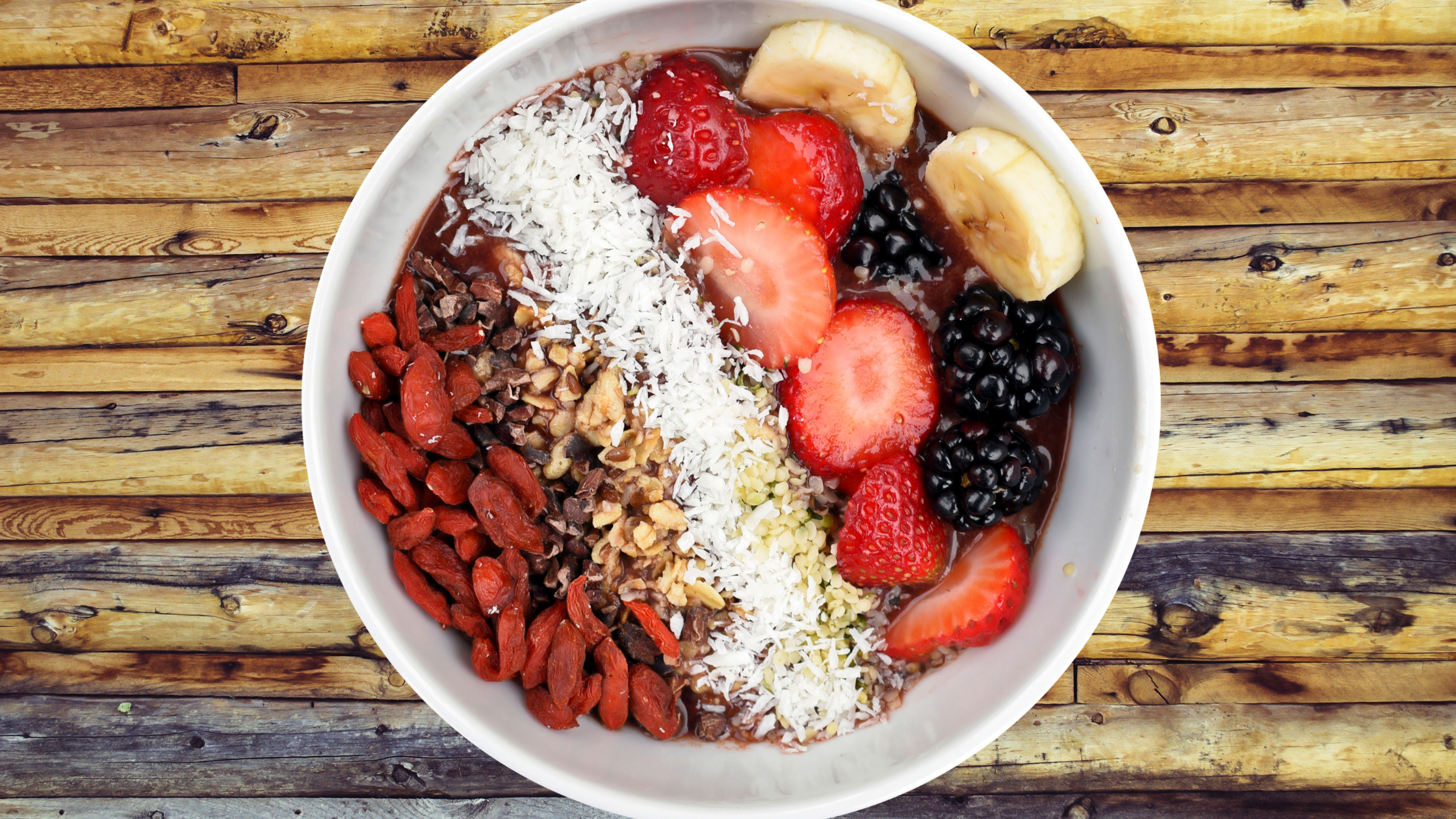 fruits and grains with yogurt in a bowl
