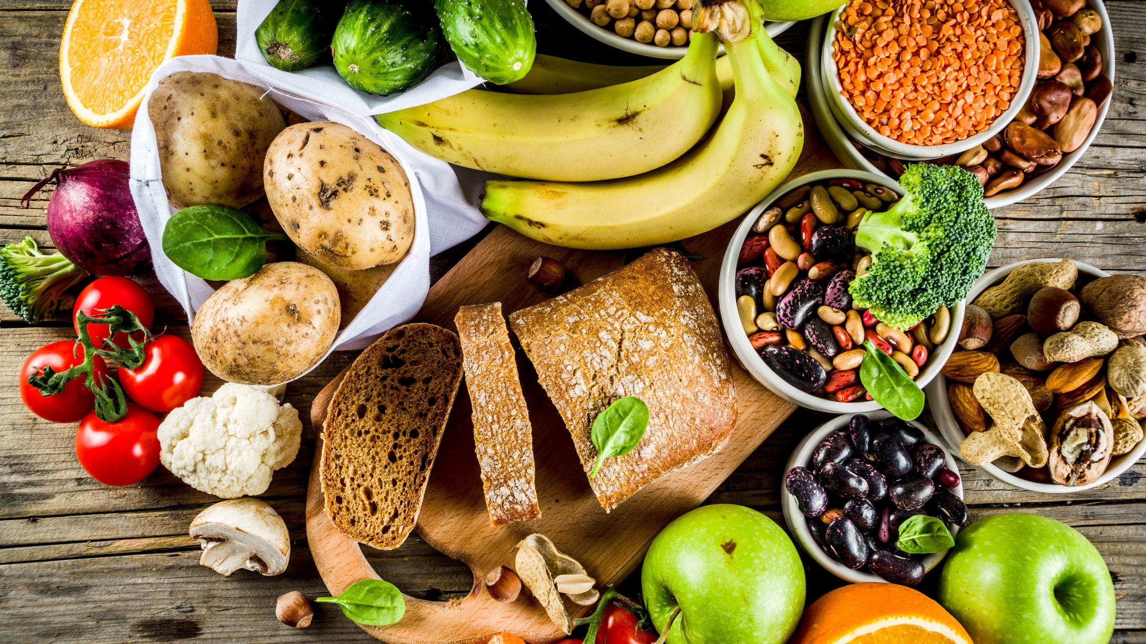 top-down view of a big pile of fruit, veggies, and grains
