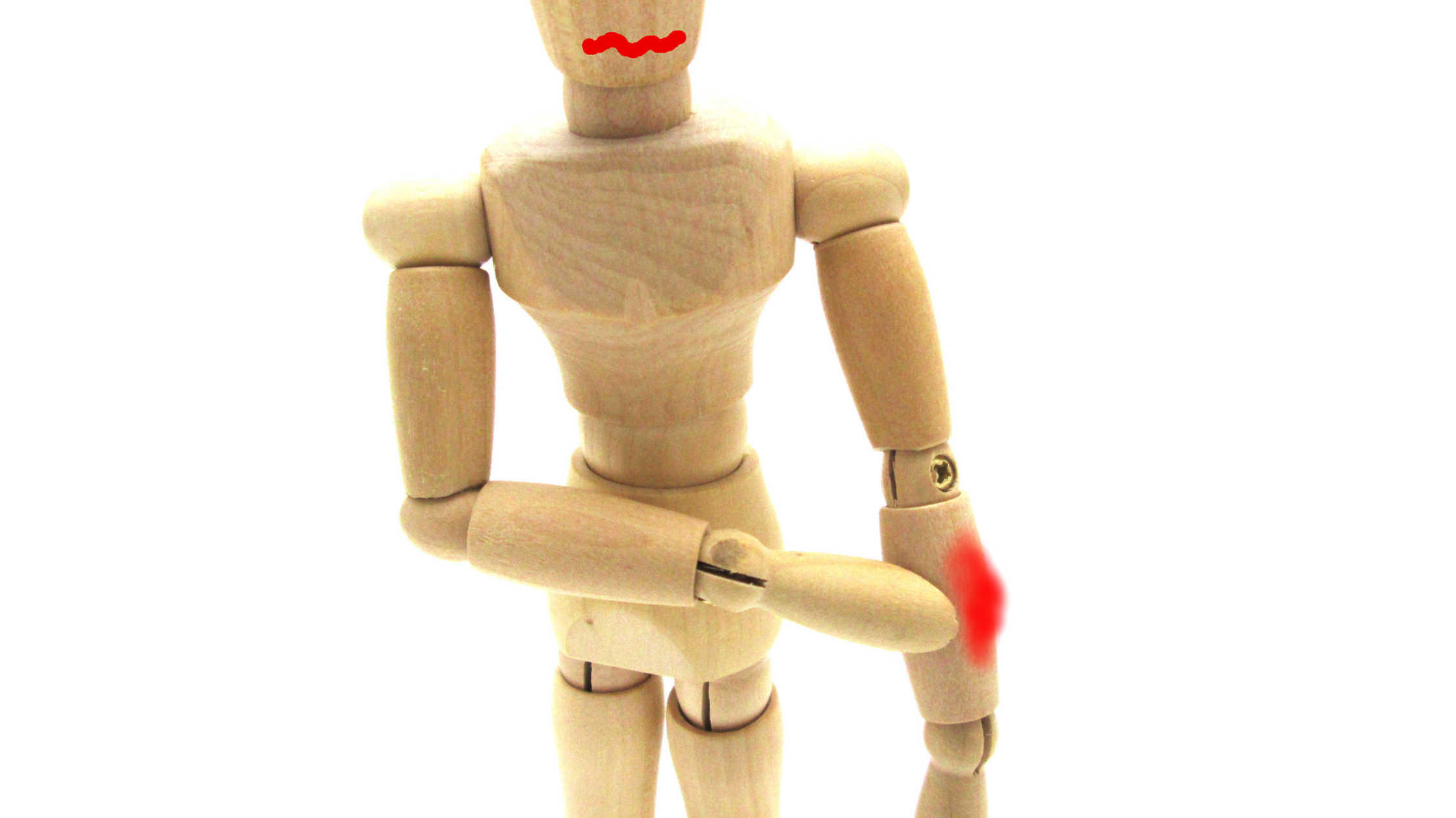 A wooden marionette with red spots indicating pain points