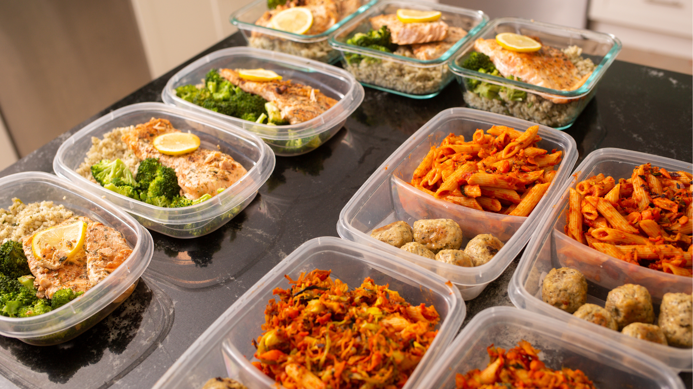 various tupperware containers of pre-portioned home cooked meals