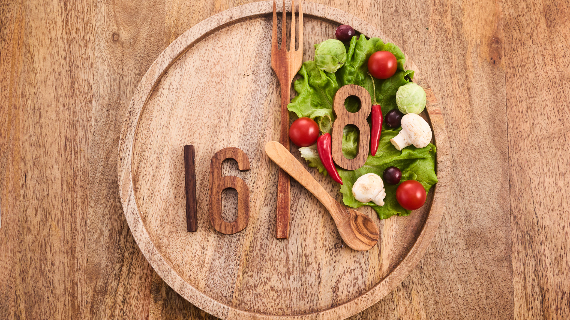 utensils used to separate a plate into two sections, and empty one labelled "16" and a full one labeled "8"