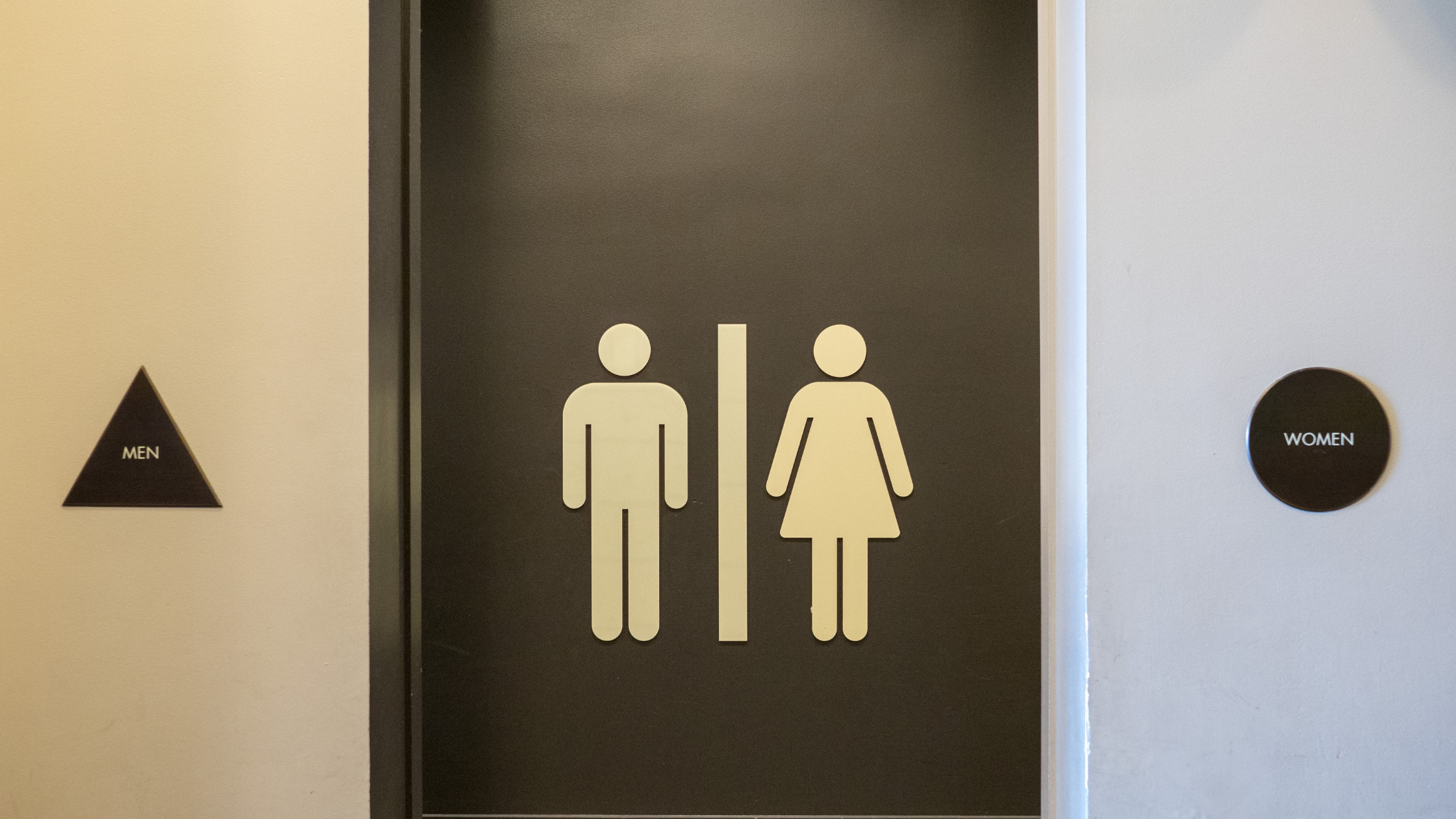 A restroom door for men/women