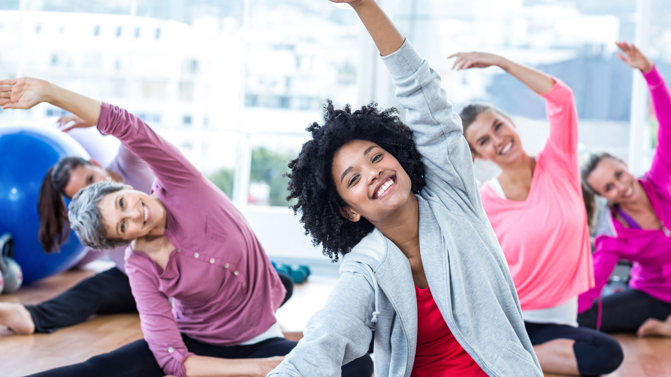 women in a group exercise class