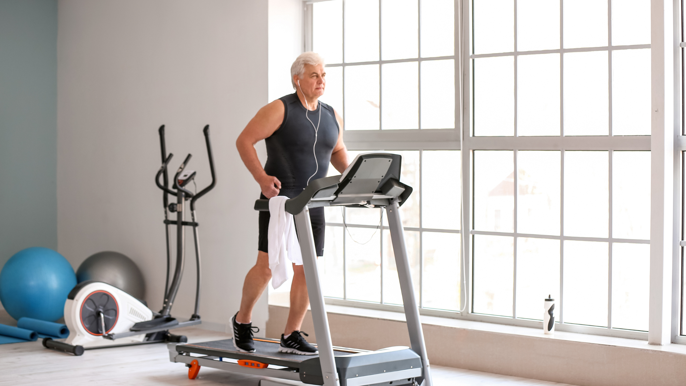 senior mad walking on a treadmill