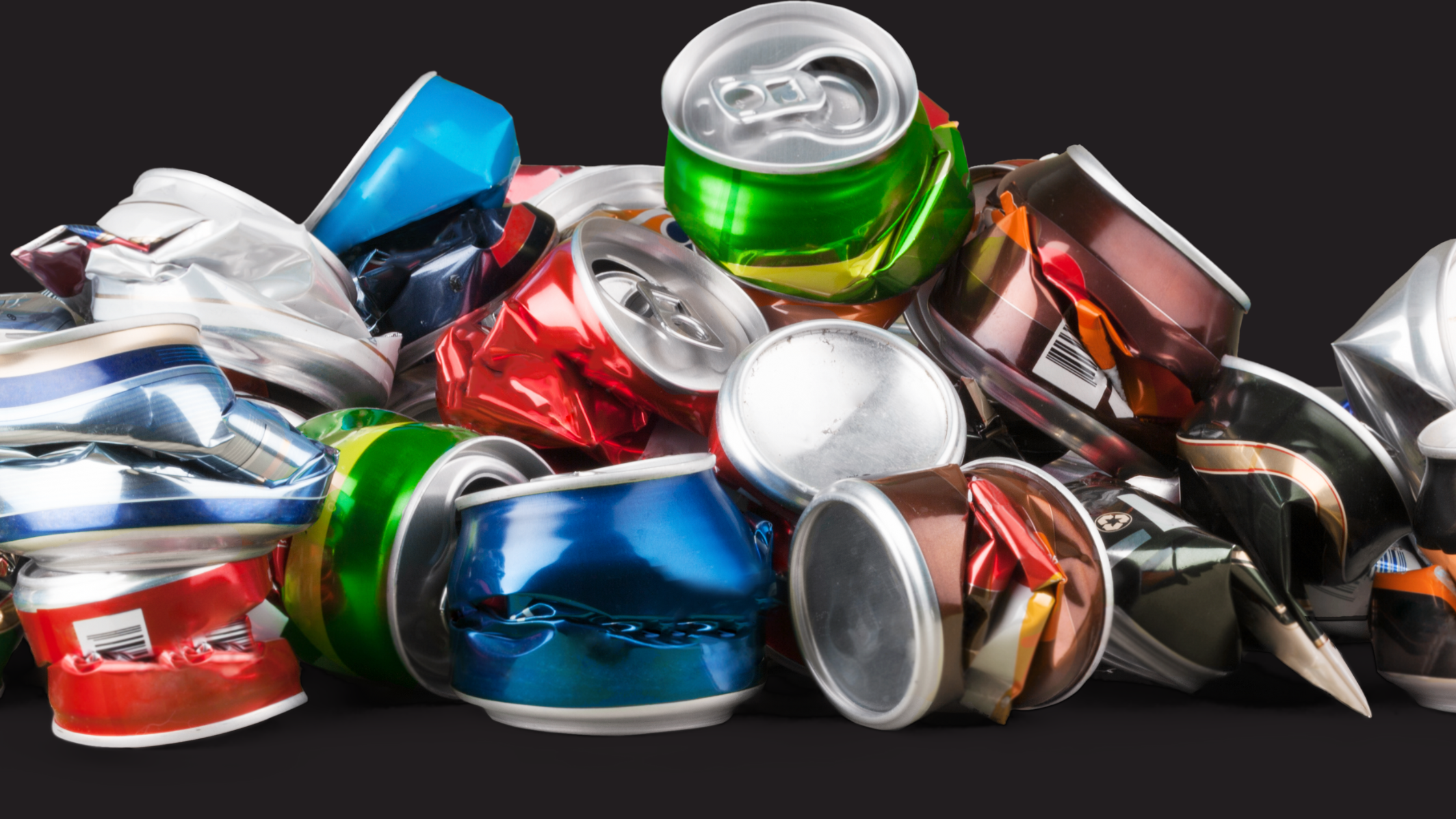 pile of crumpled soda cans