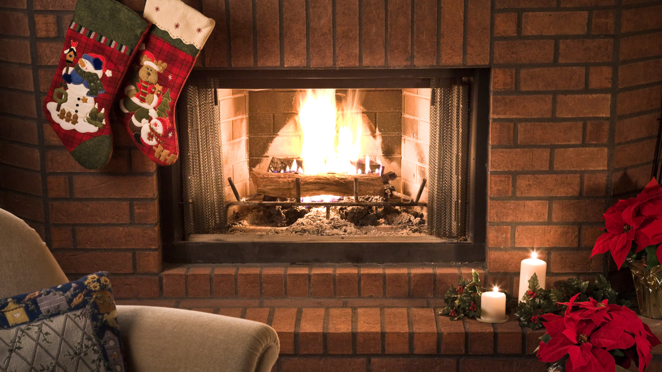 stockings hung above a roaring fireplace