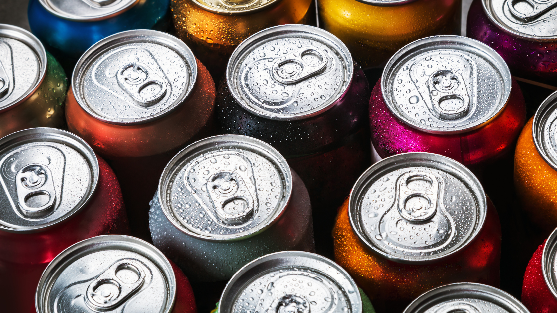 top-down view of wet soda cans