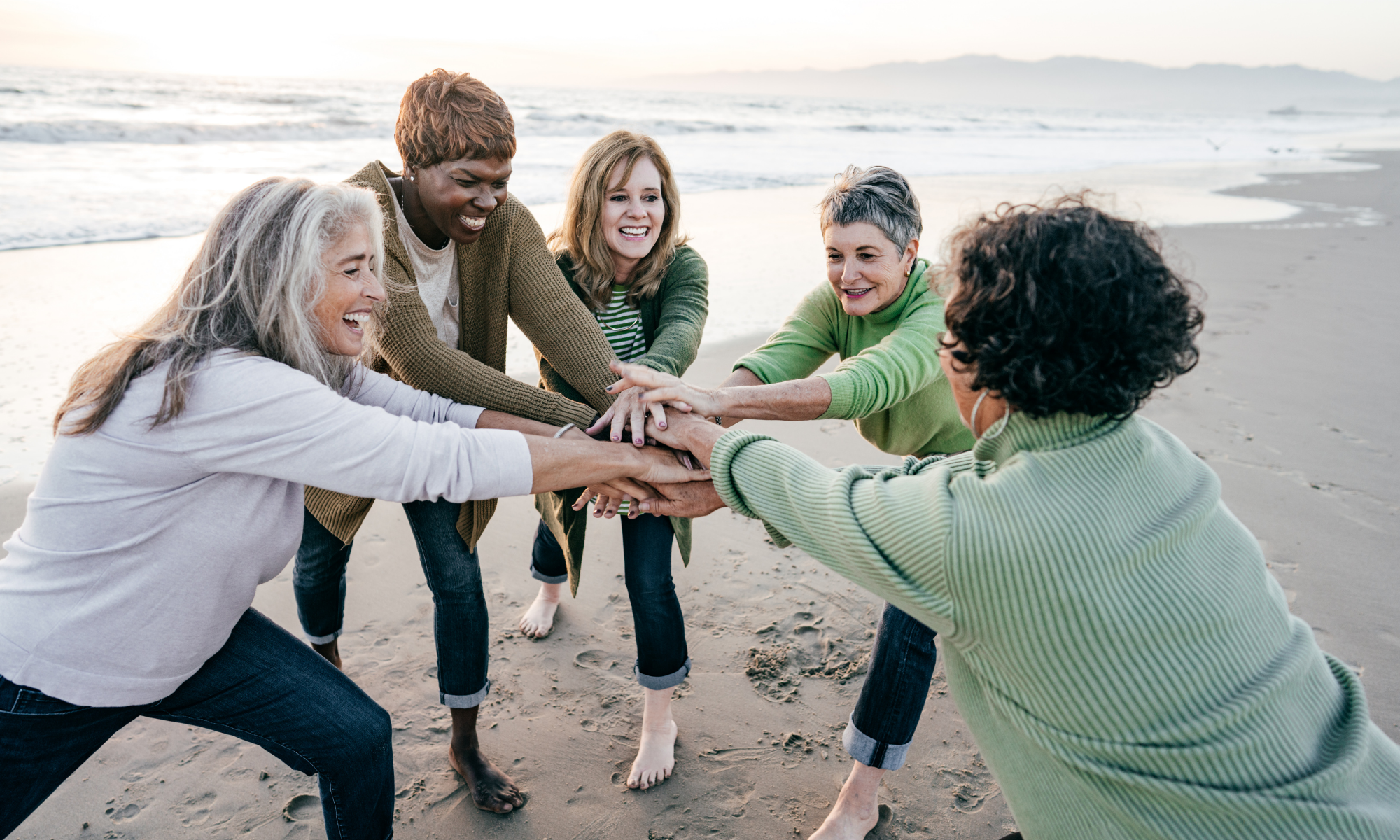 Support group enjoying the day together on the beach