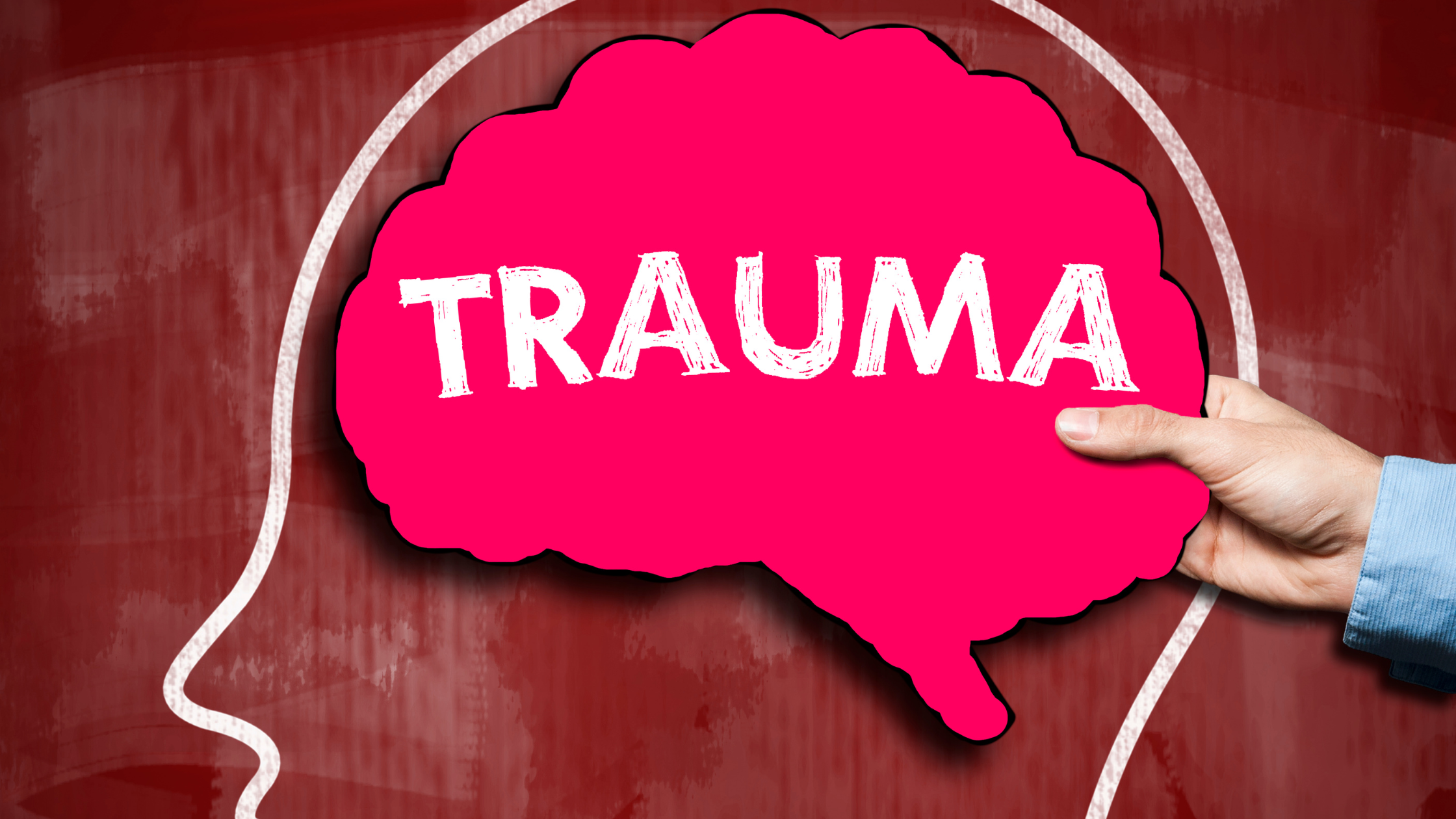 human brain shape reading "trauma" in the outline of a human head