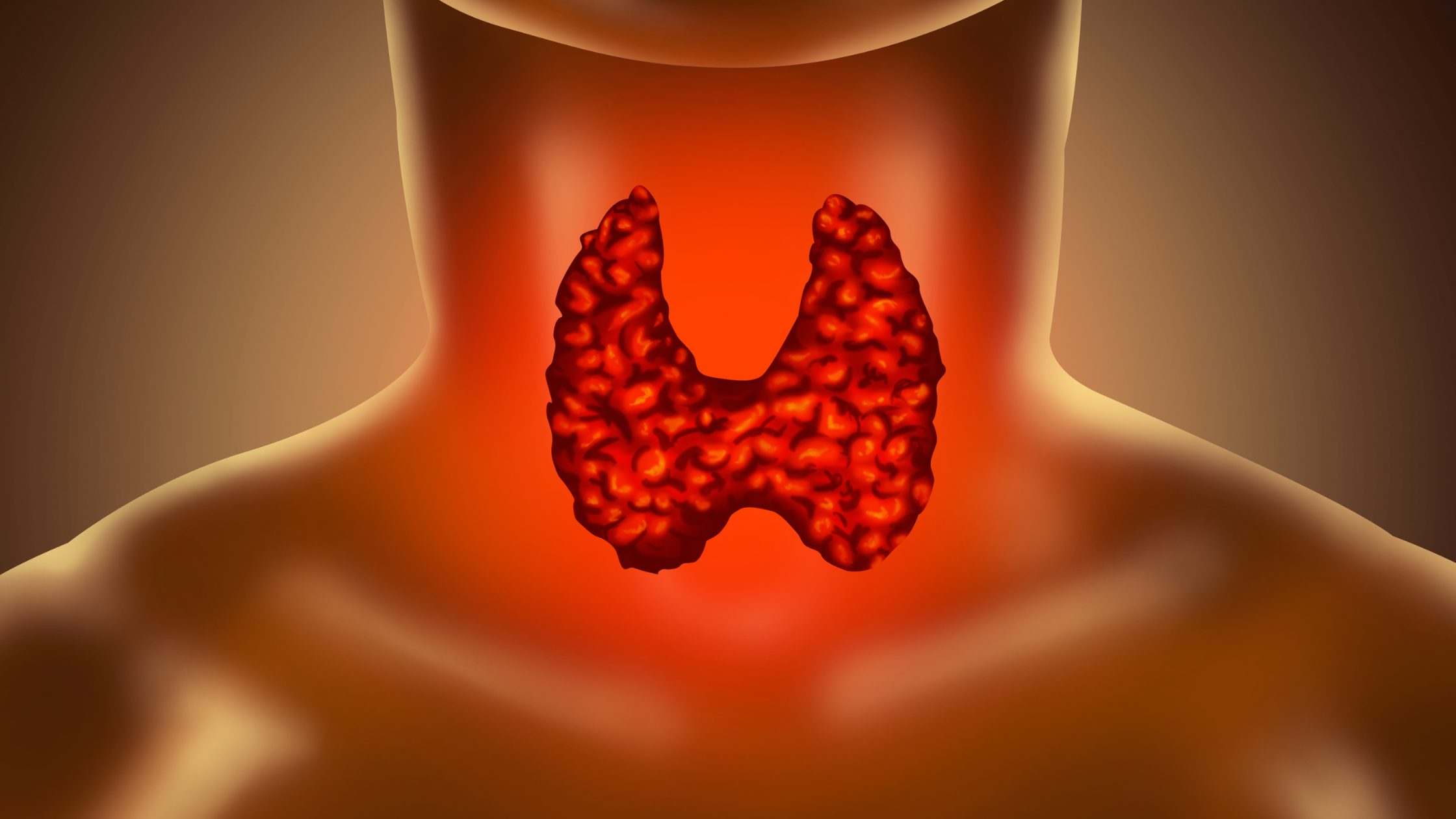 close up of a neck with a glowing red thyroid